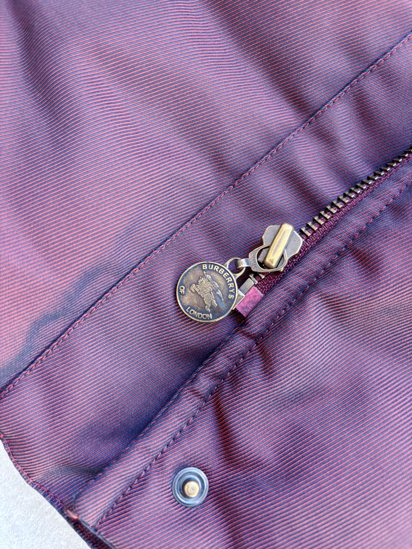 Burberry – Burgundy Synthetic Puffer Coat